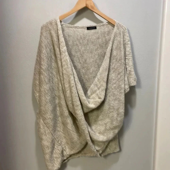 Anthropologie Sweaters - Anthropologie woman’s twisted poncho oatmeal colored sweater